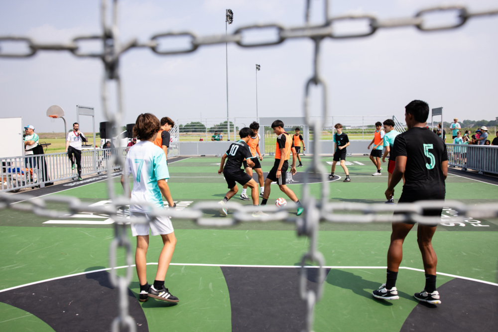 A pickup game during the Lockhart Mini-Pitch opening at Maple Street Park in Lockhart, Texas, on Saturday, May 25, 2024. (Photo by Chelsea Purgahn/Austin FC)