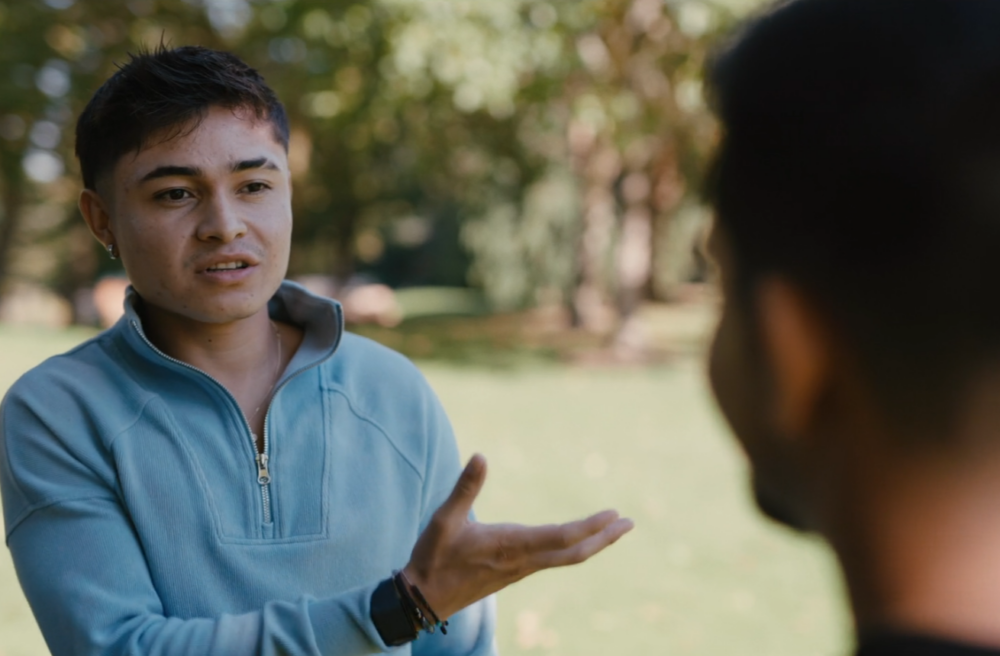 Coach-mentor facing person as he speaks