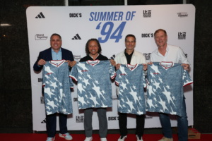 1994 U.S. Men's National Team stands holding new adidas jerseys