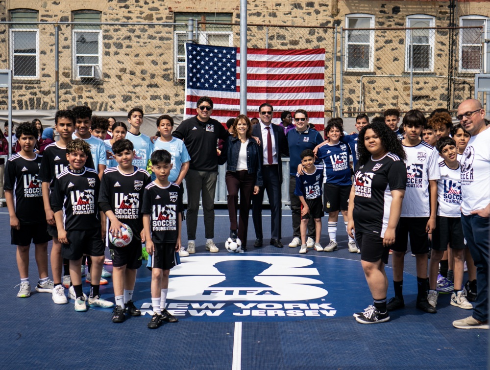 Attendees gather at the opening of a NJ mini-pitch