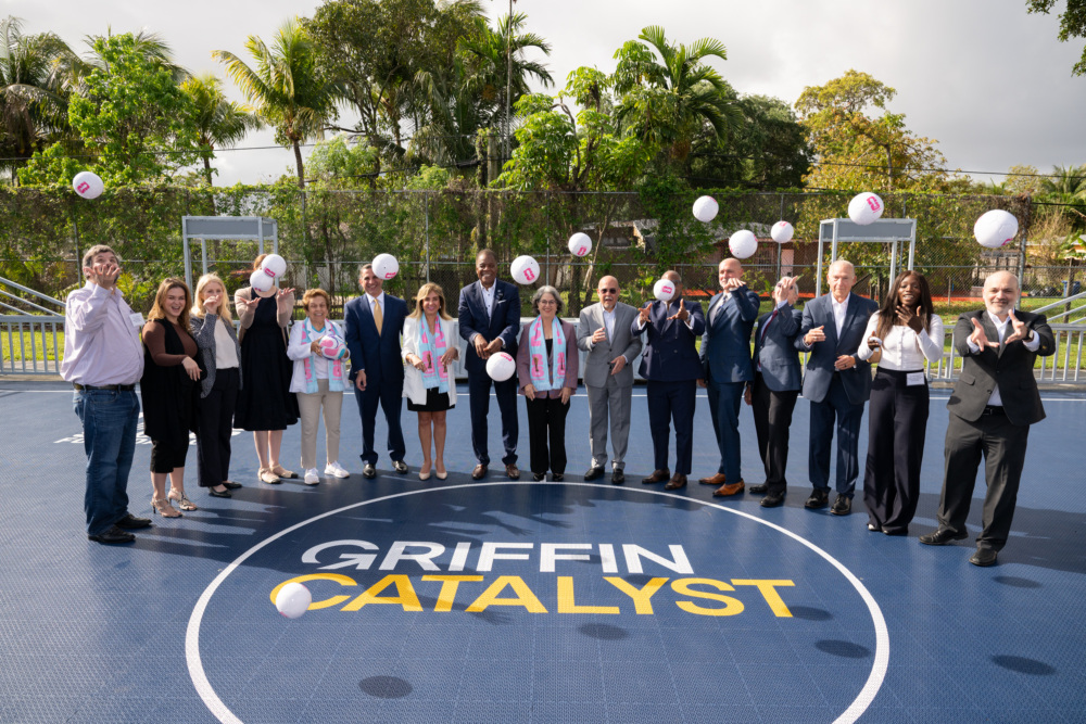 Stakeholders form the Miami-Dade Soccer Initiative at the Oak Grove Elementary mini-pitch opening.
